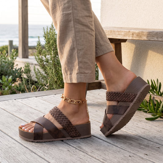 Ada | Contoured Footbed Sandals – Brown, side view worn on an Australian coastal verandah