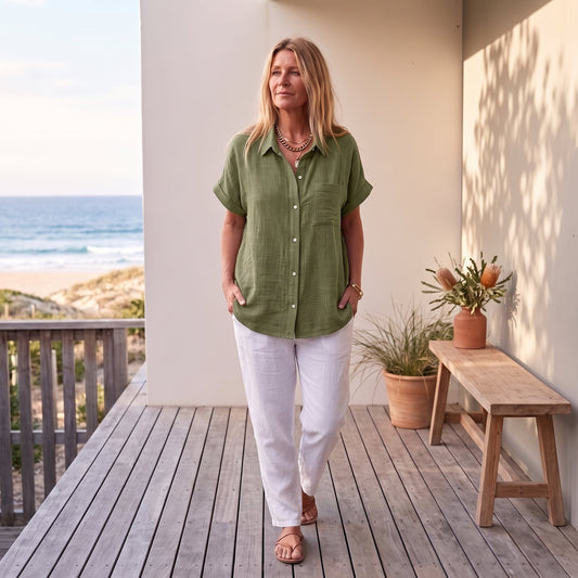 Claudia™ | Lightweight Shirt with Front Pocket – Green worn on an Australian coastal verandah
