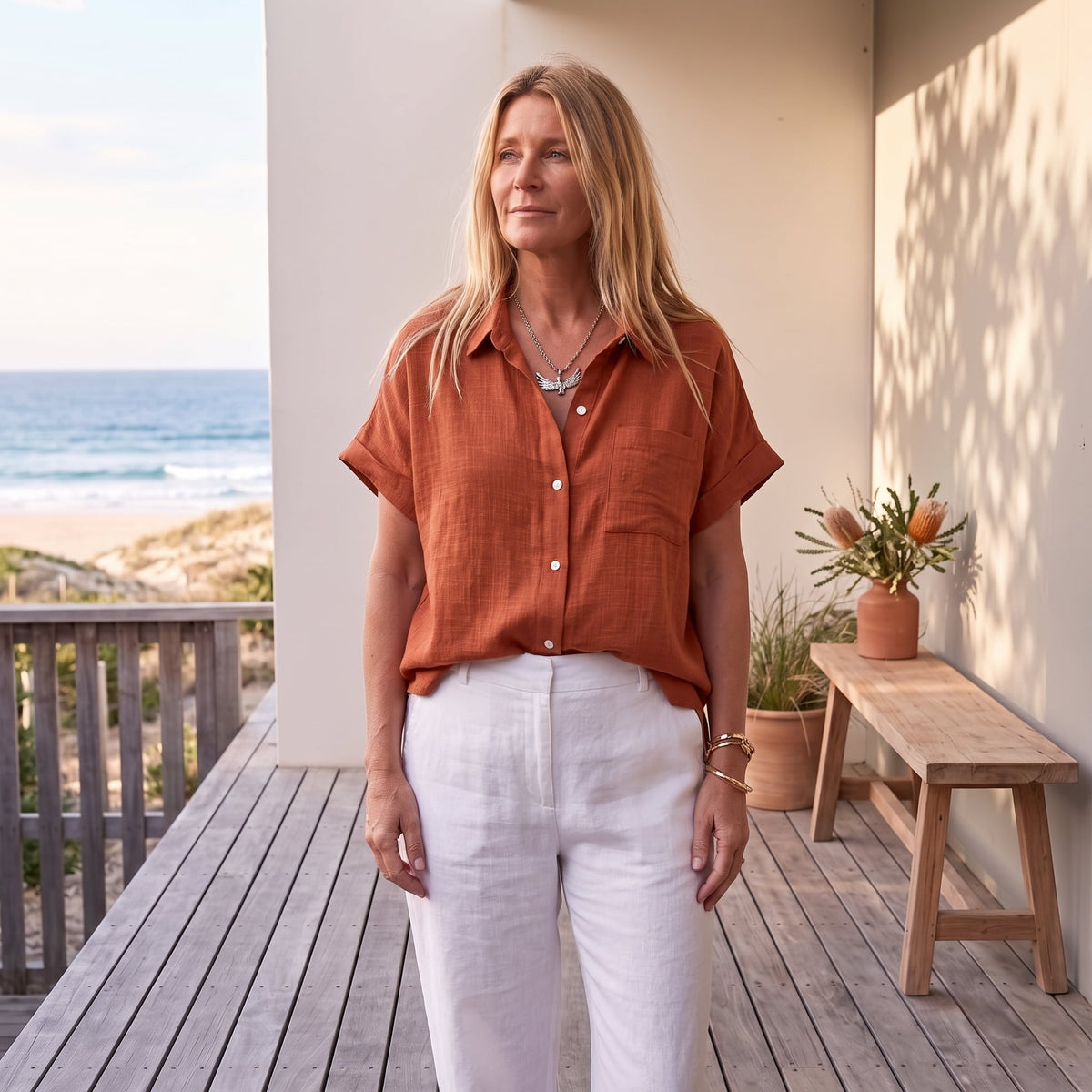 Claudia™ | Lightweight Shirt with Front Pocket – Red worn on an Australian coastal verandah