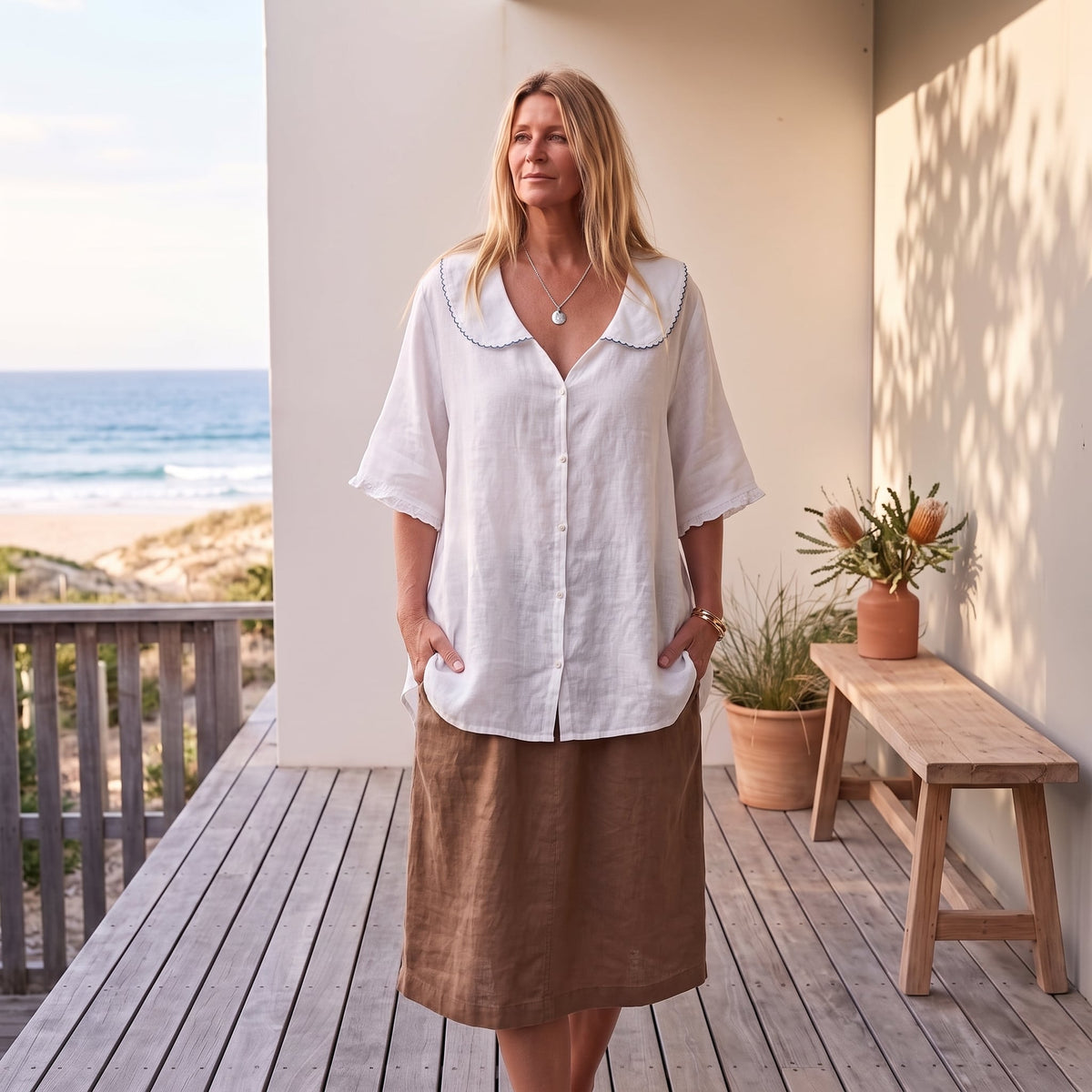 Kristi™ | Vintage Blouse with Button Detail – White worn on an Australian coastal verandah
