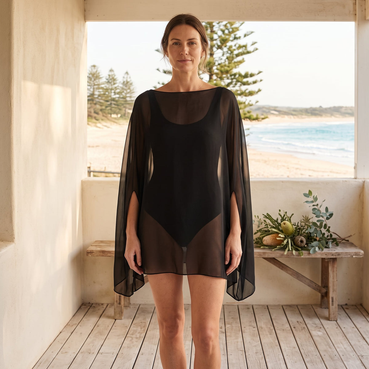 Lucinda Loose Blouse Cover-up – Black worn on an Australian coastal verandah