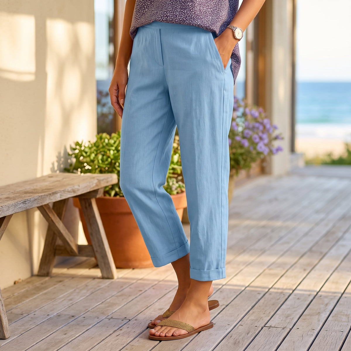 Rita™ | Light Summer Trousers – Blue worn on an Australian coastal verandah