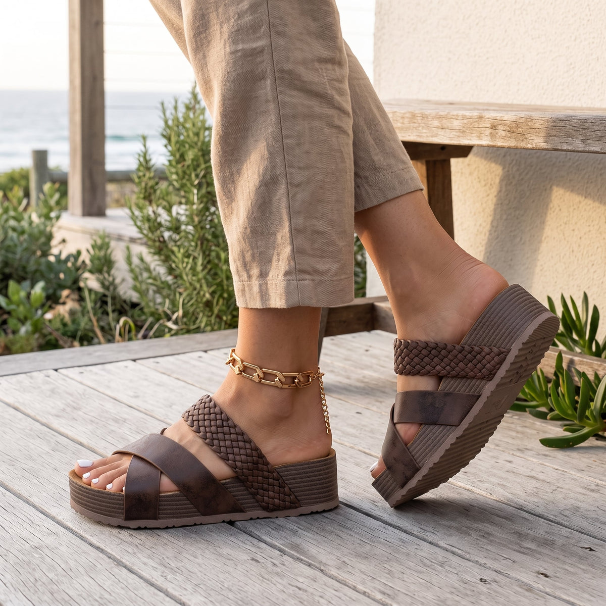 Ada | Contoured Footbed Sandals – Brown, side view worn on an Australian coastal verandah