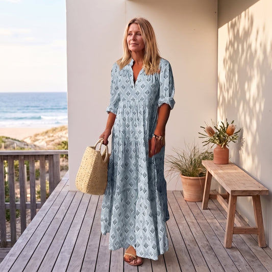 Alexa | Elegant Flowy Boho Maxi Dress – Blue worn on an Australian coastal verandah
