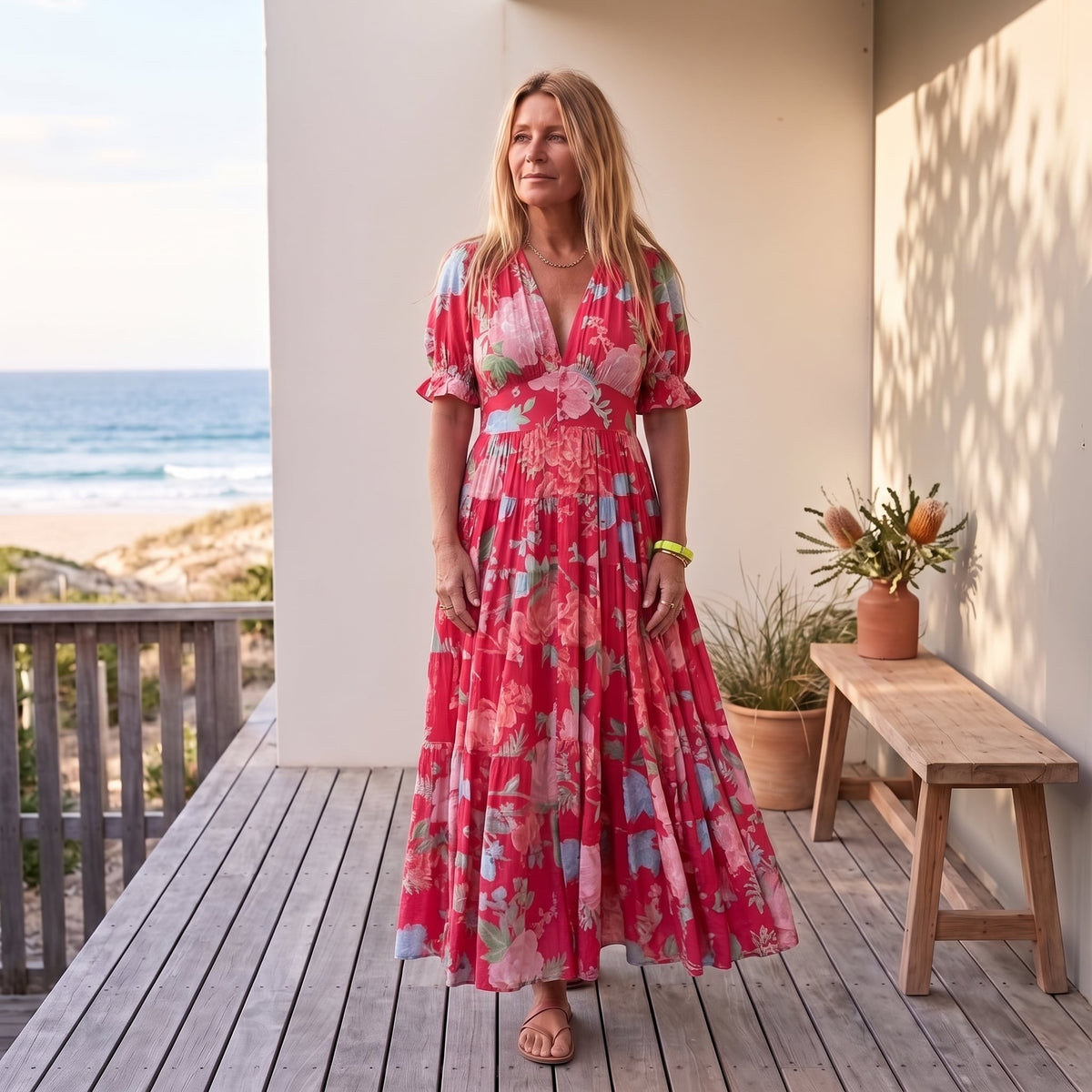 Carine | Floral Print V-Neck Pocket Dress – Red worn on an Australian coastal verandah