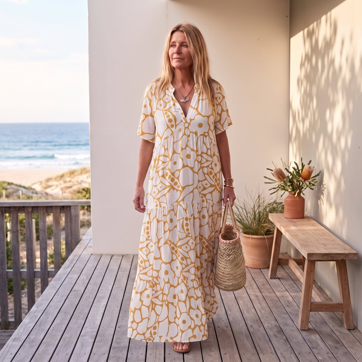 Christine | Lightweight and Fluid Summer Dress – Yellow worn on an Australian coastal verandah