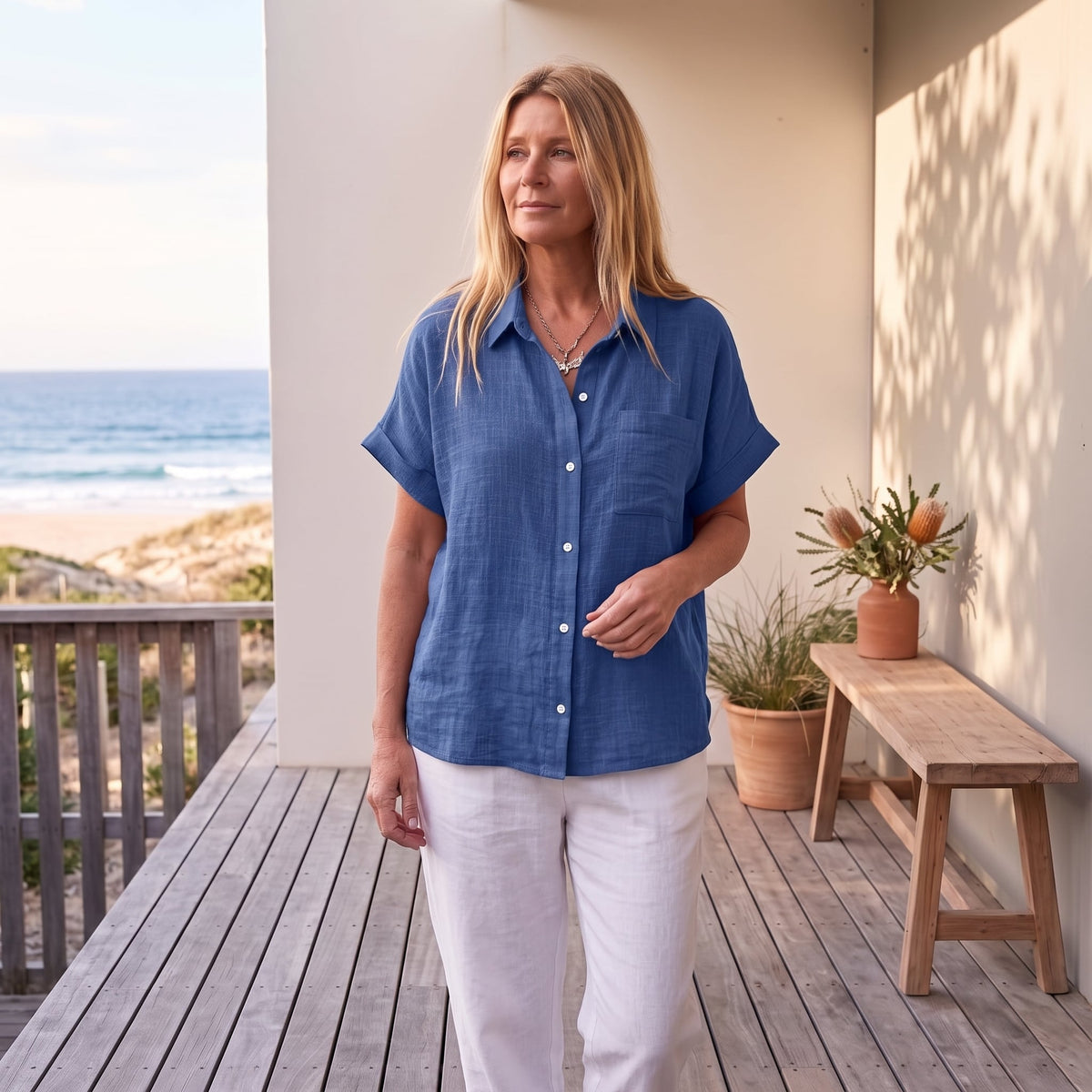 Claudia™ | Lightweight Shirt with Front Pocket – Royal Blue worn on an Australian coastal verandah