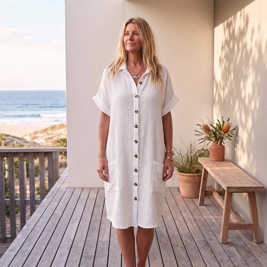Gillian | Elegant Summer Dress – White worn on an Australian coastal verandah
