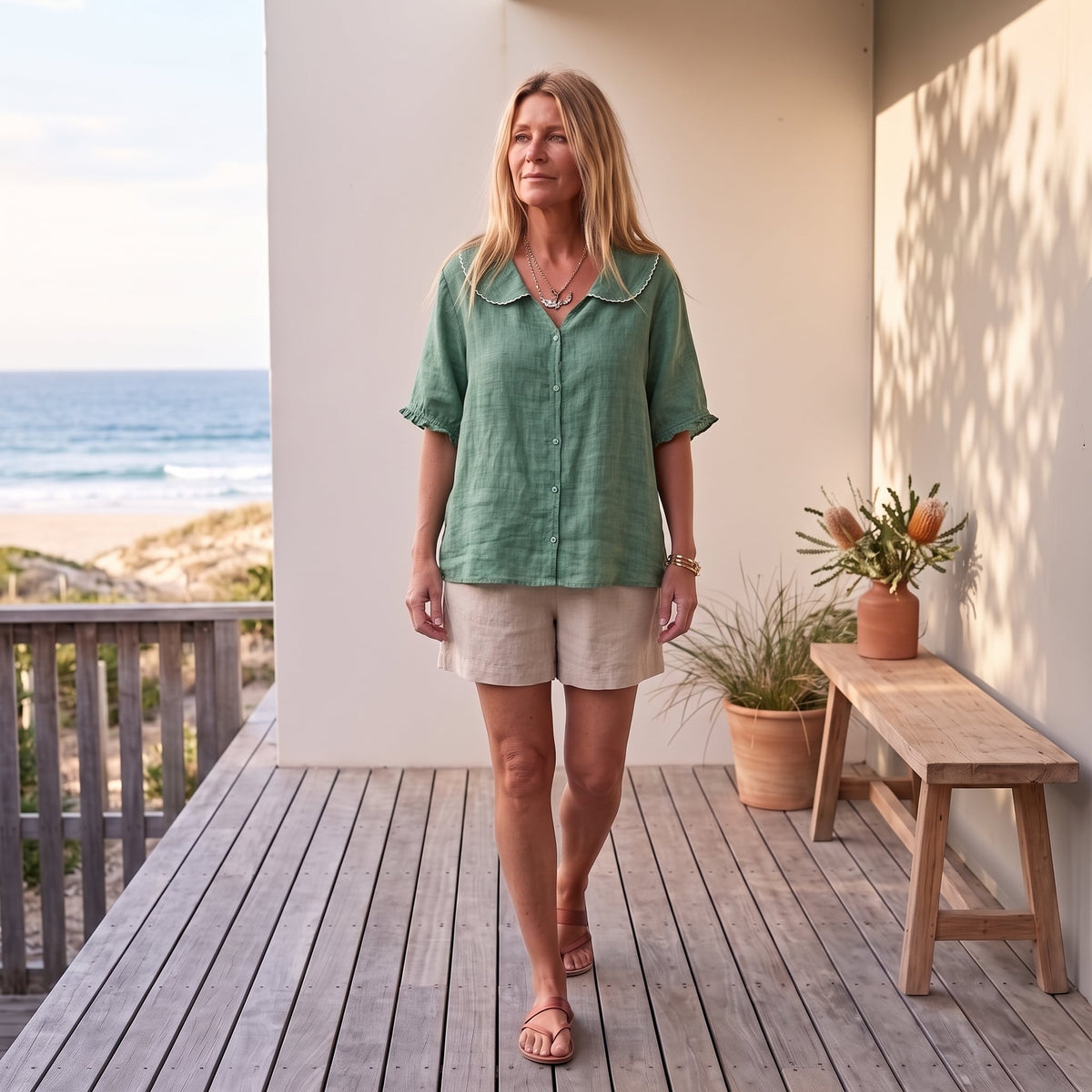 Kristi™ | Vintage Blouse with Button Detail – Green worn on an Australian coastal verandah