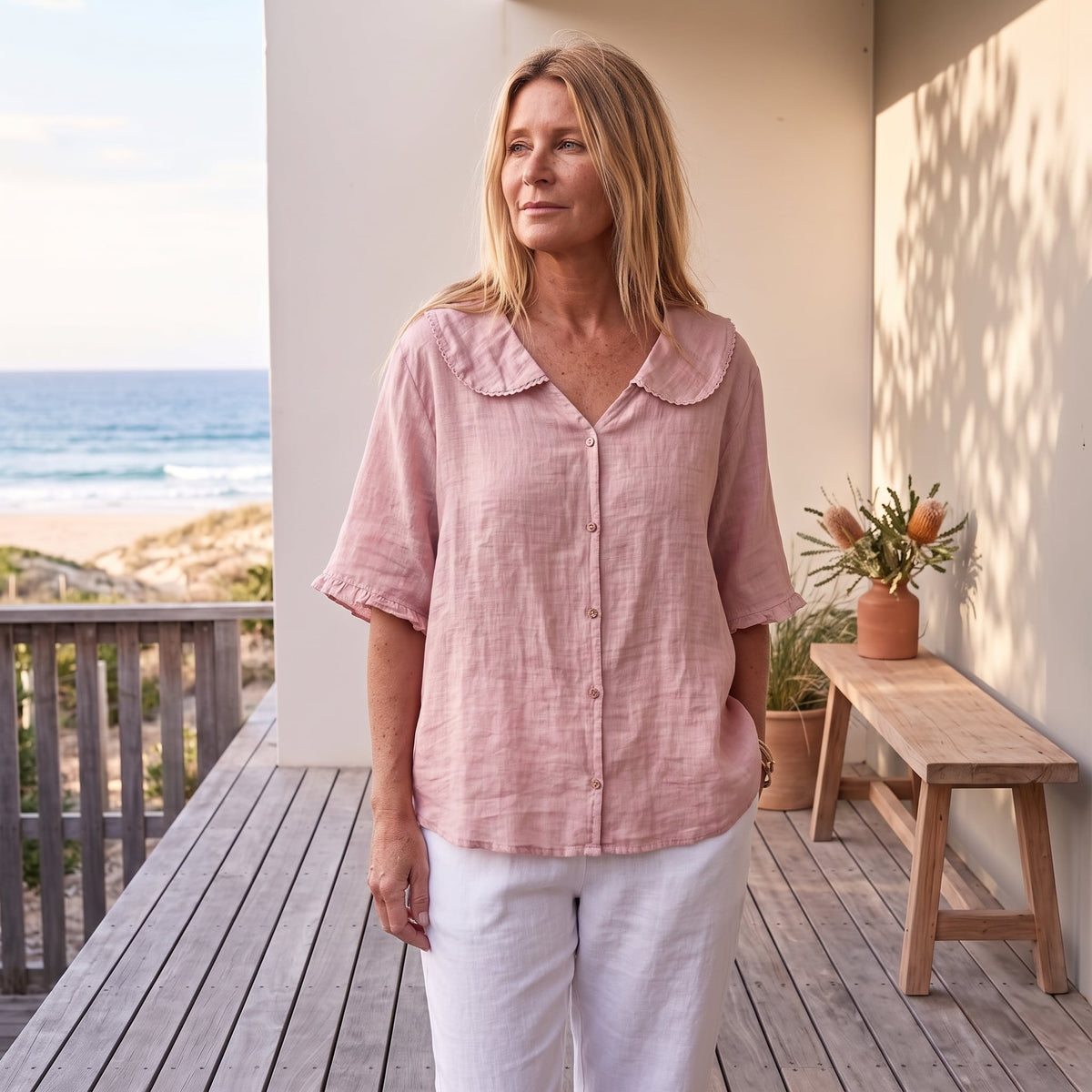 Kristi™ | Vintage Blouse with Button Detail – Pink worn on an Australian coastal verandah