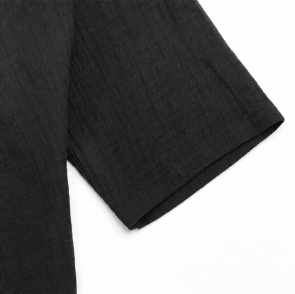 Casuarina Soraya Relaxed V-Neck Top — black sleeve detail