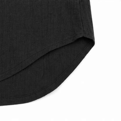 Casuarina Soraya Relaxed V-Neck Top — black curved hem detail